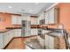 Modern kitchen with stainless steel appliances, granite countertops, and white cabinets offering ample storage space at 123 Mcdonald Ct, Summerville, SC 29485