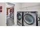Laundry room with modern appliances and a view into the walk-in closet at 123 Mcdonald Ct, Summerville, SC 29485