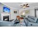 Comfortable living room featuring a fireplace, hardwood floors, and an open layout perfect for relaxation at 123 Mcdonald Ct, Summerville, SC 29485