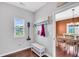 Practical mudroom with a bench, coat hooks, and natural light, providing a convenient space to store outdoor gear and maintain organization at 123 Mcdonald Ct, Summerville, SC 29485