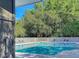 Tranquil pool area featuring lounge chairs and shower with surrounding lush trees at 123 Mcdonald Ct, Summerville, SC 29485