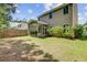 Charming home with a large, grassy backyard, screened in patio, and a wooden privacy fence at 134 Longford Dr, Summerville, SC 29483