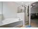 Bathroom featuring glass door shower, tub, and is connected to the main bedroom at 134 Longford Dr, Summerville, SC 29483