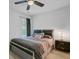 Relaxing bedroom boasts a soft carpet, black out curtains and a sleek bed frame at 134 Longford Dr, Summerville, SC 29483