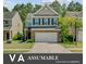Home with brick and siding exterior, two-car garage and inviting curb appeal at 134 Longford Dr, Summerville, SC 29483