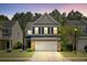 Charming home with brick and siding exterior, two-car garage and inviting curb appeal at 134 Longford Dr, Summerville, SC 29483