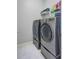 Laundry room featuring modern washer and dryer units and plenty of storage space for detergents at 134 Longford Dr, Summerville, SC 29483