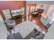 Open-concept living room features a high ceiling, large windows, dining area and hardwood floors at 134 Longford Dr, Summerville, SC 29483
