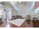 Open living room with hardwood floors, vaulted ceiling, and comfortable furnishings at 134 Longford Dr, Summerville, SC 29483