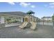 Community playground with slides and a covered picnic area for parents to relax in the shade at 134 Longford Dr, Summerville, SC 29483