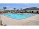Community pool with ample space for swimming, along with a covered picnic area and playground nearby at 134 Longford Dr, Summerville, SC 29483