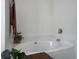 Bright bathroom featuring a modern, inviting bathtub with chrome fixtures and minimalist decor at 139 Pointer Dr, Goose Creek, SC 29445