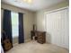 Bedroom with a desk, window with curtains, and double door closet at 139 Pointer Dr, Goose Creek, SC 29445
