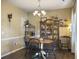 Well-appointed dining area with classic china cabinet, round wooden table with seating for four, and ample natural light at 139 Pointer Dr, Goose Creek, SC 29445
