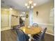 Inviting dining area featuring a round table with seating and an open layout flowing into other parts of the home at 139 Pointer Dr, Goose Creek, SC 29445