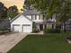Charming two-story home featuring a two-car garage and well-manicured lawn at 139 Pointer Dr, Goose Creek, SC 29445