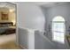 Hallway with staircase and window next to a bedroom with carpet flooring at 139 Pointer Dr, Goose Creek, SC 29445