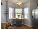 Bright kitchen with hardwood floors, stainless steel refrigerator and a breakfast table at 139 Pointer Dr, Goose Creek, SC 29445