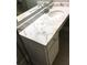 A bathroom featuring a marble countertop and a vessel sink at 14 Lockwood Dr # 2E, Charleston, SC 29401