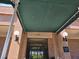 Front view of the building entrance with brick exterior and a covered walkway at 14 Lockwood Dr # 2E, Charleston, SC 29401