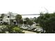 Scenic view of building exterior and parking area, highlighting location near waterfront at 14 Lockwood Dr # 2E, Charleston, SC 29401