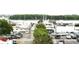 Waterfront marina view showcasing boat slips, various boats, and parking at 14 Lockwood Dr # 2E, Charleston, SC 29401