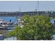Beautiful water view including a bridge, boats, and mature landscaping on a sunny day at 14 Lockwood Dr # 2E, Charleston, SC 29401