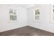 Bedroom featuring hard wood floors and windows with shutter-style blinds at 1470 Eutaw Battalion Dr, Charleston, SC 29412