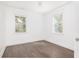 Bright and open bedroom with neutral walls and floors, and dual windows at 1470 Eutaw Battalion Dr, Charleston, SC 29412
