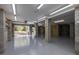 Bright unfinished garage with an open overhead door, block walls and epoxy floors at 1470 Eutaw Battalion Dr, Charleston, SC 29412