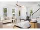 Bright and airy living room with stylish furniture, hardwood floors, and natural light from multiple windows at 1470 Eutaw Battalion Dr, Charleston, SC 29412