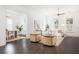 Spacious living room with an open floor plan, stylish furnishings, and seamless transition to the adjacent dining area at 1470 Eutaw Battalion Dr, Charleston, SC 29412