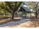 Park pavilion with mature trees and a gravel path at 1470 Eutaw Battalion Dr, Charleston, SC 29412