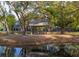Covered pavilion in park with mature trees and pond at 1470 Eutaw Battalion Dr, Charleston, SC 29412