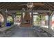 A look inside the community pavilion with picnic tables and an outdoor fireplace at 1470 Eutaw Battalion Dr, Charleston, SC 29412