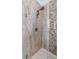 The walk-in shower features river rock accents and a handheld shower head at 1470 Eutaw Battalion Dr, Charleston, SC 29412