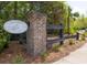 Community entrance sign, Freeman's Point on James Island, framed by landscaping and trees at 1470 Eutaw Battalion Dr, Charleston, SC 29412