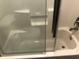 This bathroom features a bathtub and a partially obscured toilet at 1496 Cypress Pointe Dr, Mount Pleasant, SC 29466