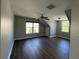 The bedroom is illuminated with natural light and has wood floors at 1496 Cypress Pointe Dr, Mount Pleasant, SC 29466
