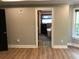 Bedroom showcases doorway that provides a peek into the bathroom at 1496 Cypress Pointe Dr, Mount Pleasant, SC 29466