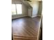 Bedroom with hardwood floors, a ceiling fan, and plenty of sunlight at 1496 Cypress Pointe Dr, Mount Pleasant, SC 29466