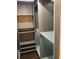This is a view of a closet with built in shelving and hardwood floors at 1496 Cypress Pointe Dr, Mount Pleasant, SC 29466