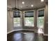 Cozy dining space with a modern chandelier and natural light at 1496 Cypress Pointe Dr, Mount Pleasant, SC 29466