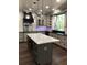 Kitchen with a white marble island and stainless steel hood at 1496 Cypress Pointe Dr, Mount Pleasant, SC 29466