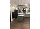 Spacious kitchen with an island, stainless steel oven hood and hardwood floors at 1496 Cypress Pointe Dr, Mount Pleasant, SC 29466