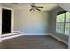 Spacious living room featuring hardwood floors, natural light, and steps at 1496 Cypress Pointe Dr, Mount Pleasant, SC 29466