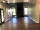 Spacious and inviting living room with a fireplace and large windows, perfect for gatherings at 1496 Cypress Pointe Dr, Mount Pleasant, SC 29466