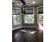 Cozy area bathed in natural light from the large windows, a great spot to relax at 1496 Cypress Pointe Dr, Mount Pleasant, SC 29466