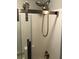 Modern shower-tub with a glass door and sleek shower fixtures at 1496 Cypress Pointe Dr, Mount Pleasant, SC 29466
