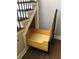 Pull-out storage drawer under the staircase with ample space at 1496 Cypress Pointe Dr, Mount Pleasant, SC 29466